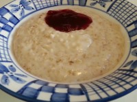 Simple oatmeal with strawberry jam.